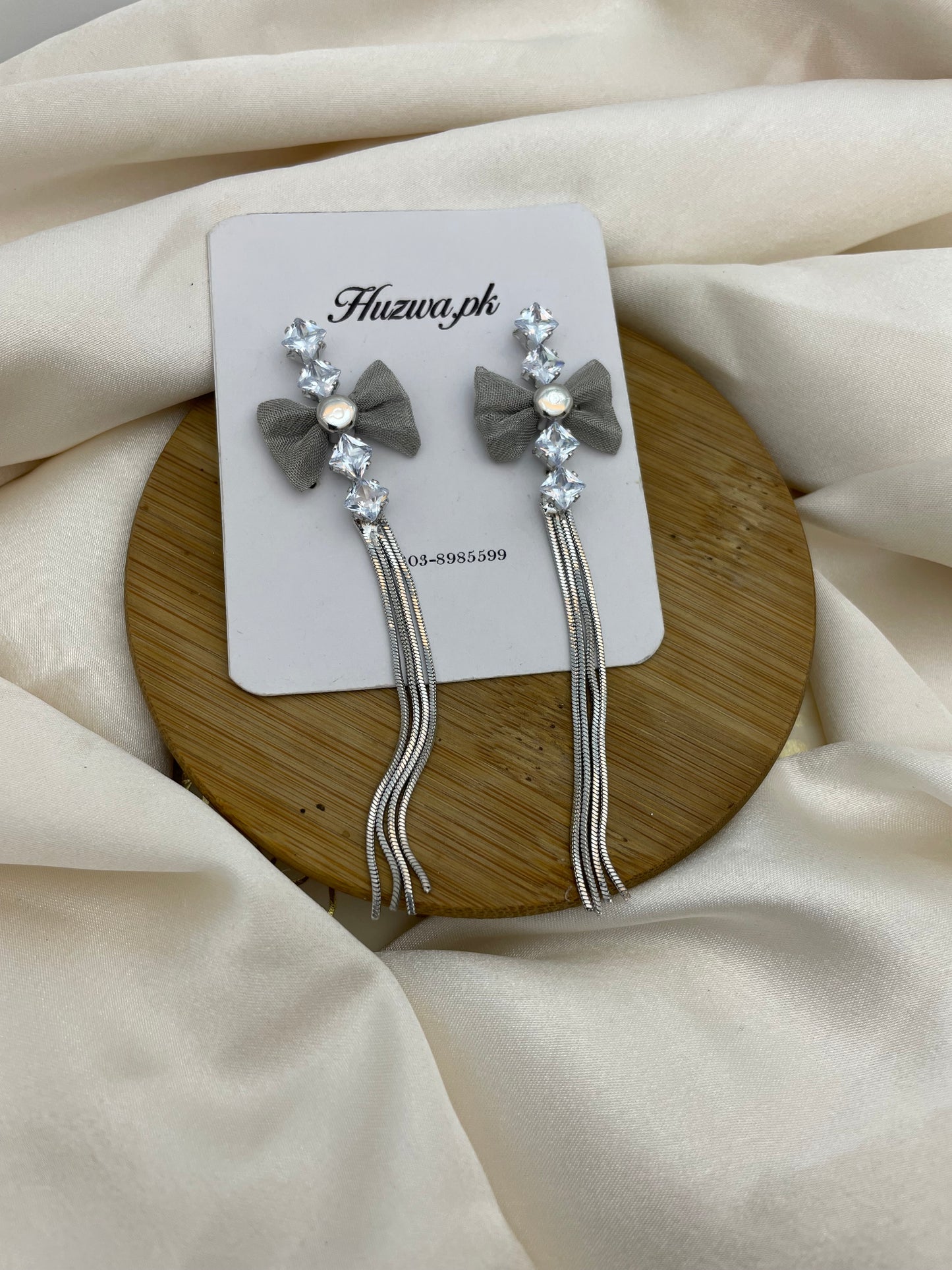 Silver Bow Long Earrings
