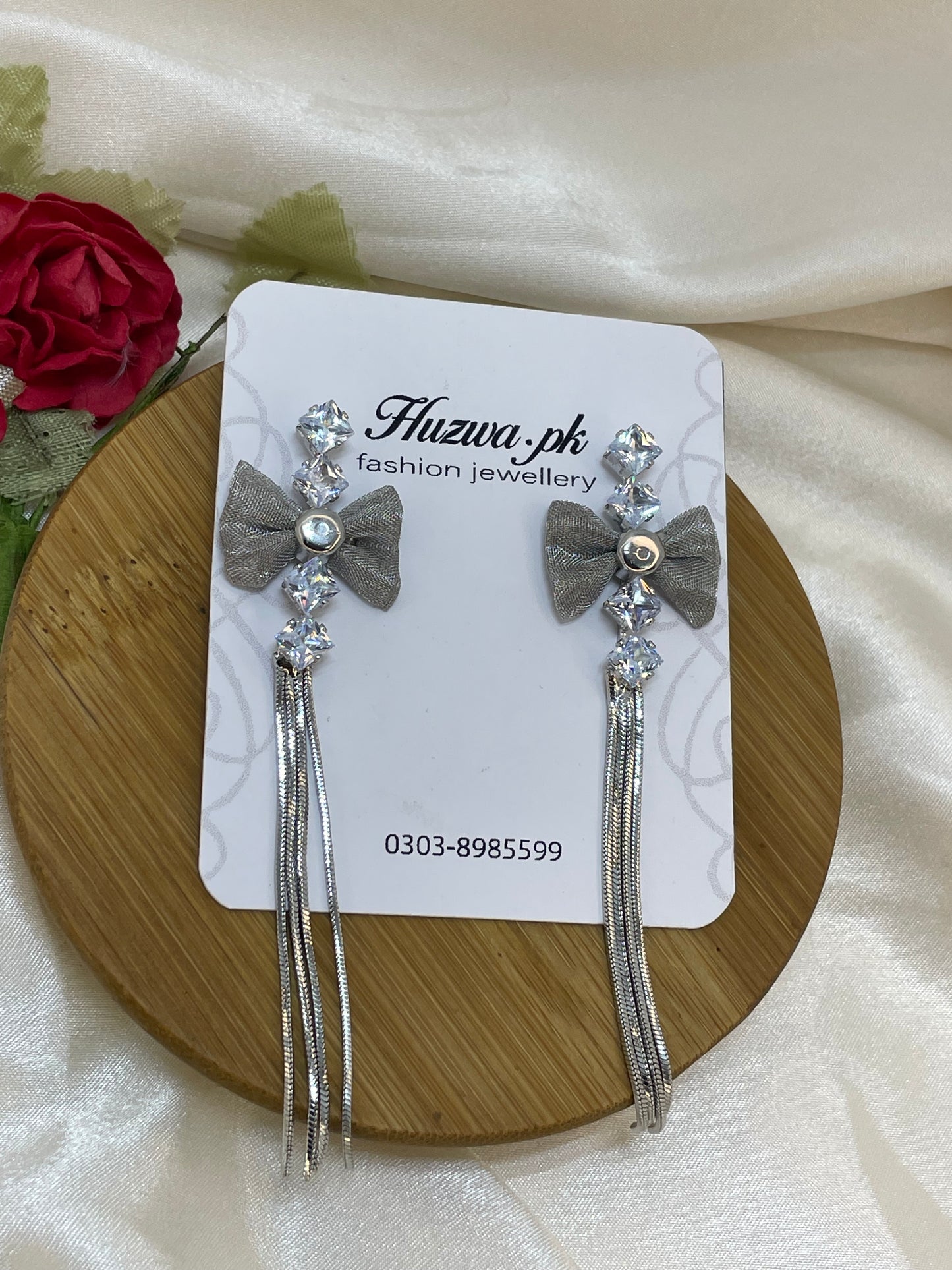 Silver Bow Long Earrings