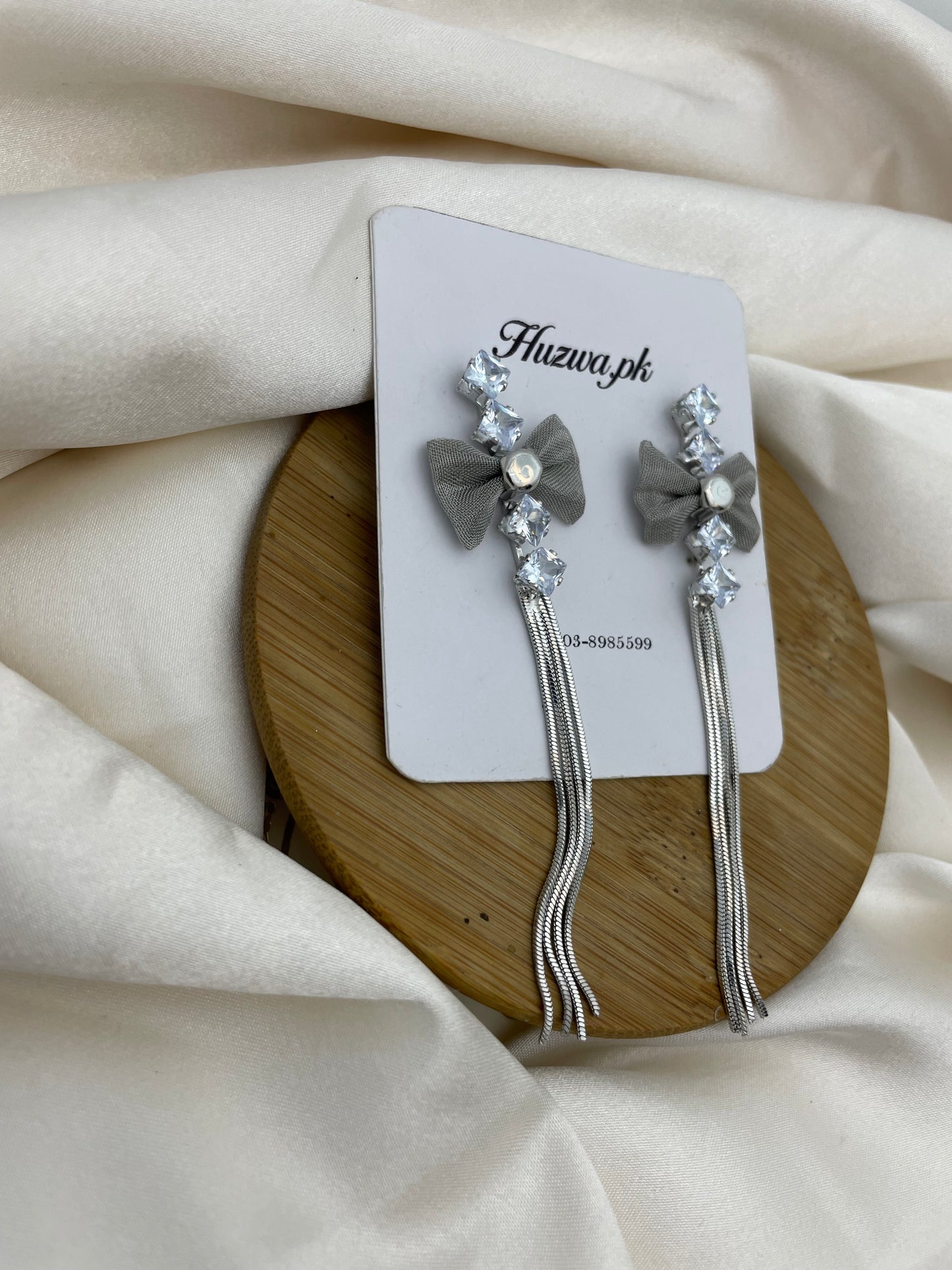 Silver Bow Long Earrings